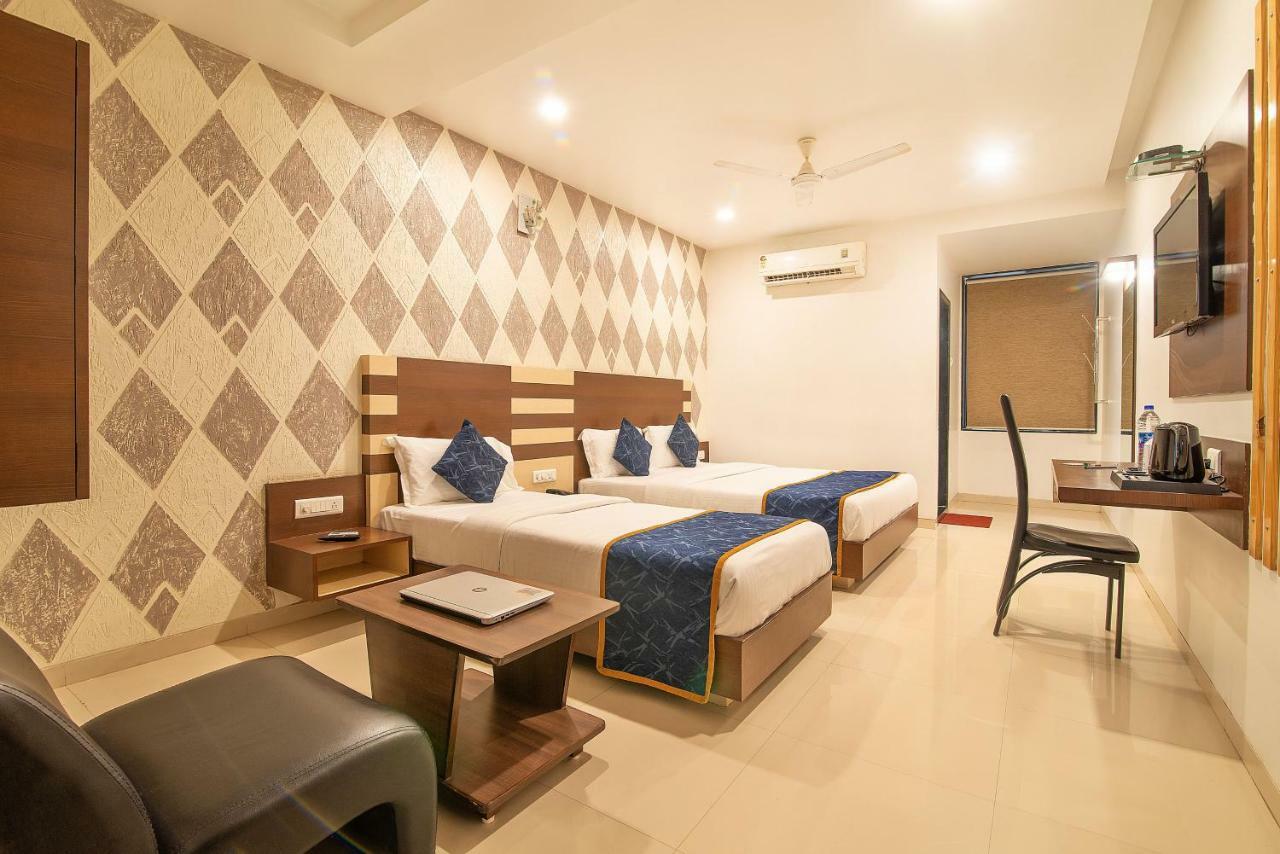 Hotel Sheetal Plaza Surat Exterior photo