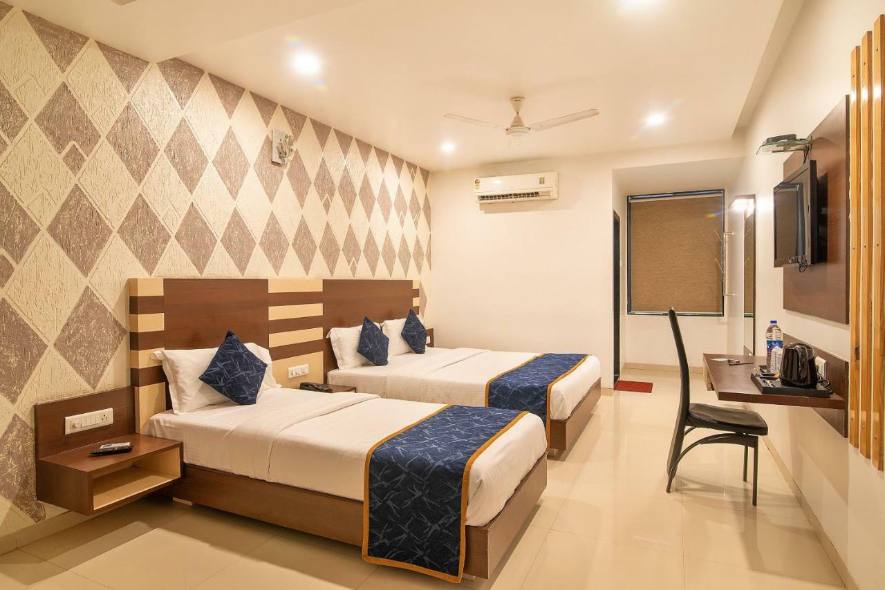 Hotel Sheetal Plaza Surat Exterior photo