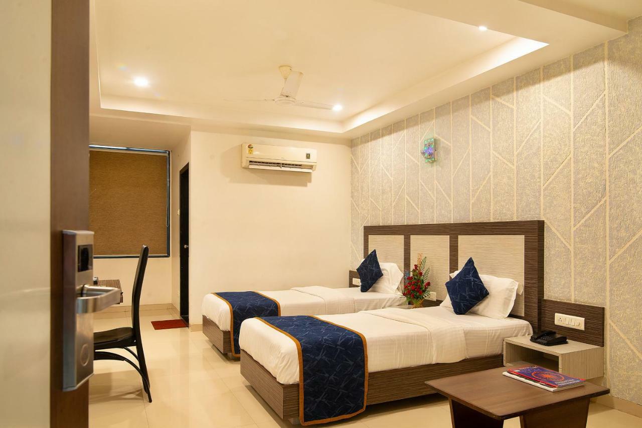 Hotel Sheetal Plaza Surat Exterior photo